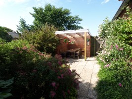 Auf der Terrasse das Wetter genießen. / Ferienwohnung "Damitz" in Hattstedtermarsch