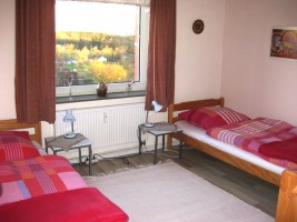 Schlafzimmer mit zwei Einzelbetten / Ferienwohnung  in Husum