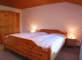 Schlafzimmer mit Doppelbett / Bauernhof/Ferienhof "Ferienwohnung auf dem Bauernhof" in Nordstrand