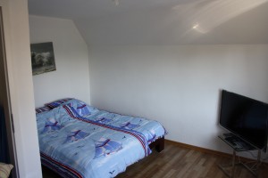 1. Schlafzimmer im Obergeschoss. / Ferienhaus "DEKO" in Husum