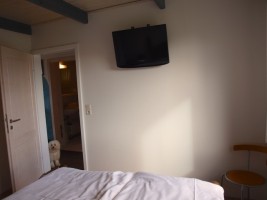 Fernseher im Schlafzimmer / Ferienhaus "Ebbe und Flut" in Simonsberg