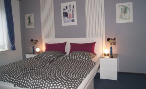SchlafzimmerNr.1 mit einem
Doppelbett / Ferienwohnung "Ilsebill" in Husum
