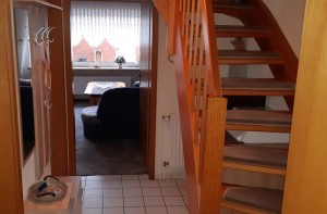 Treppenaufgang zum Schlafzimmer und Badezimmer. / Ferienwohnung "Ferienwohnung Hansen" in Husum