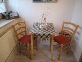 Sitzgelegenheit in der Küche für zwei Personen / Ferienwohnung "Achtern Diek" in Simonsberg
