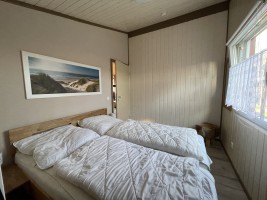 Schlafzimmer mit Doppelbett / Ferienhaus "Haus Nixe" in Simonsberg