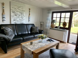 Tür vom Wohnzimmer zu Therasse / Ferienhaus "Ferienhaus Neukoog II" in Nordstrand