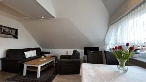 Wohnzimmer lädt zum relaxen ein / Ferienwohnung "Haus Schuldt" in Mildstedt/Husum