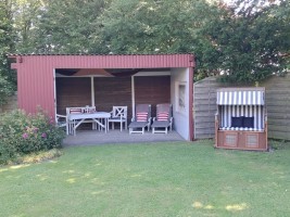 Die Gemeinschaftsterrasse mit Elektrogrill / Ferienwohnung "Op England" in Nordstrand